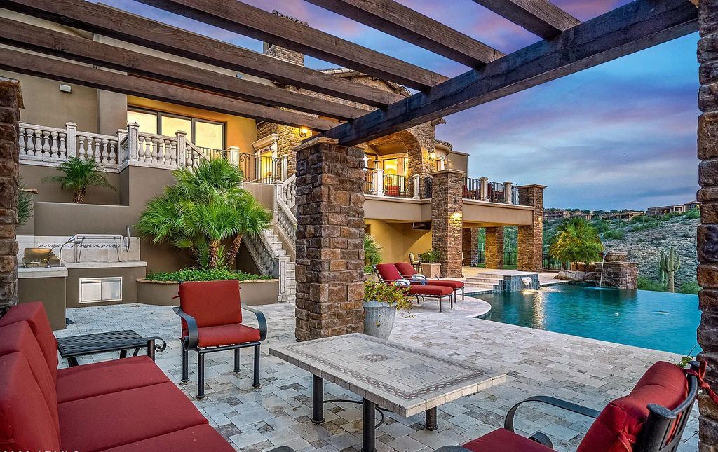 14371 E Kalil Drive, Scottsdale, Arizona is a custom home with captivating views situated on almost an acre in a private gated enclave just minutes from Scottsdale's renowned golf, restaurant, and shopping.