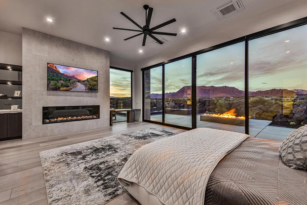 2399 N Kiva Trail, Saint George, Utah is a truly one of a kind contemporary estate sits 28 feet above the street below, boasts 360 degree views, including a picture perfect framing of Snow Canyon, Red Mountain, Pine Valley Mountain, Movie Rock, and the Kachina Cliffs.