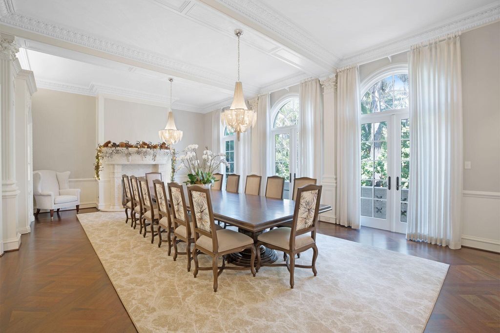 1110 S Ocean Boulevard, Manalapan, Florida is a one-of a kind estate with 150 feet of ocean and Intracoastal frontage perfect for entertaining with features in rich details, intricate millwork, and sophisticated finishes.