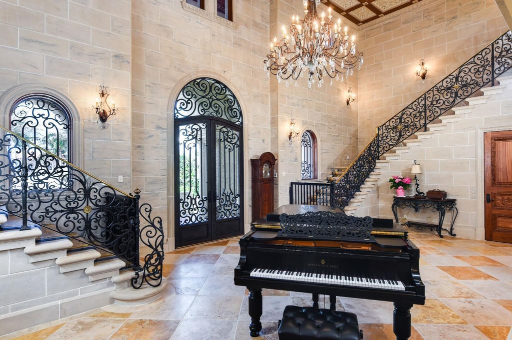 1110 S Ocean Boulevard, Manalapan, Florida is a one-of a kind estate with 150 feet of ocean and Intracoastal frontage perfect for entertaining with features in rich details, intricate millwork, and sophisticated finishes.