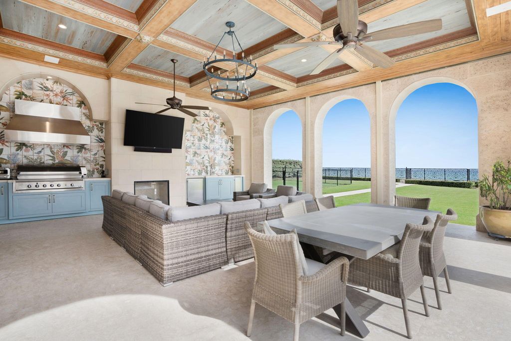 1110 S Ocean Boulevard, Manalapan, Florida is a one-of a kind estate with 150 feet of ocean and Intracoastal frontage perfect for entertaining with features in rich details, intricate millwork, and sophisticated finishes.