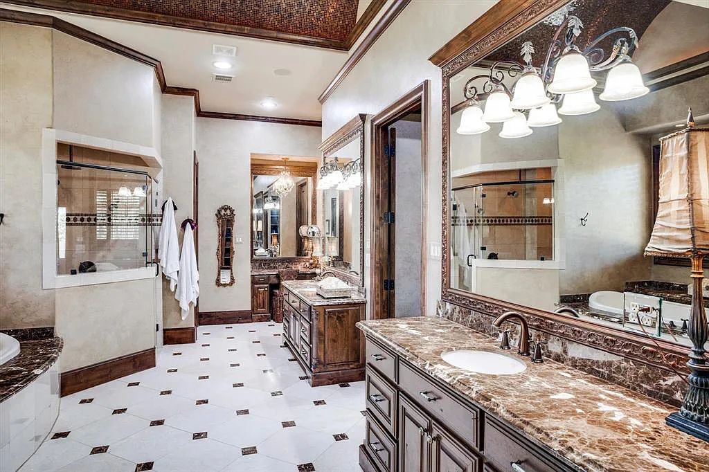 1101 E Hickory Hill Road, Argyle, Texas is a meticulous estate with amazing amenities including 4 fireplaces, climate-controlled wine room accommodates 250-300 bottles, exercise room, guest suite, game room, poker room, media room.