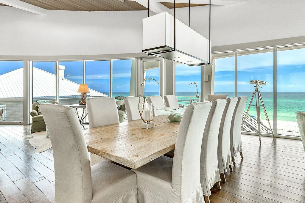 125 Gulf Dunes Lane, Santa Rosa Beach, Florida is a one of a kind home with a rare 90 feet of gulf frontage in the gated and rental restricted neighborhood of Gulf Dunes blending cutting edge contemporary architectural design with cozy comfortable interiors.