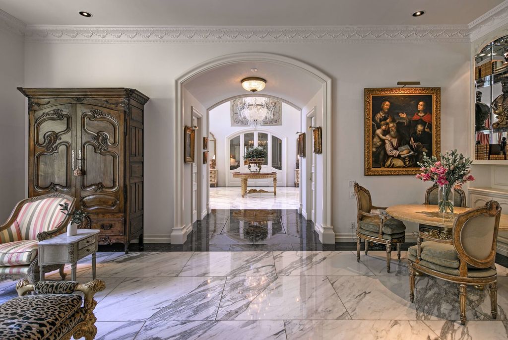 815 Cord Circle, Beverly Hills, California is a palatial residence sited on over a 1/2 acre with complete privacy, grounds are magical in every sense featuring a Roman style pool, fresco paintings and formal gardens.