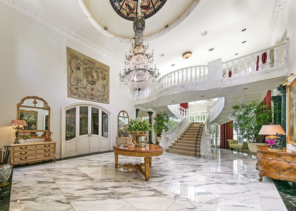 815 Cord Circle, Beverly Hills, California is a palatial residence sited on over a 1/2 acre with complete privacy, grounds are magical in every sense featuring a Roman style pool, fresco paintings and formal gardens.