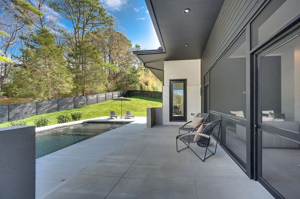 The Home in Nashville checks all the boxes with a heated salt water pool, main level primary and guest suites, now available for sale. This home located at 226 Brook Hollow Rd, Nashville, Tennessee
