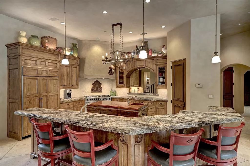 11111 Claymore Road, Houston, Texas is an extraordinary home on an amazing 0.95 acre lot with impressive amenities including temperature controlled wine room for 2200+ bottles, well-equipped kitchen, and more.