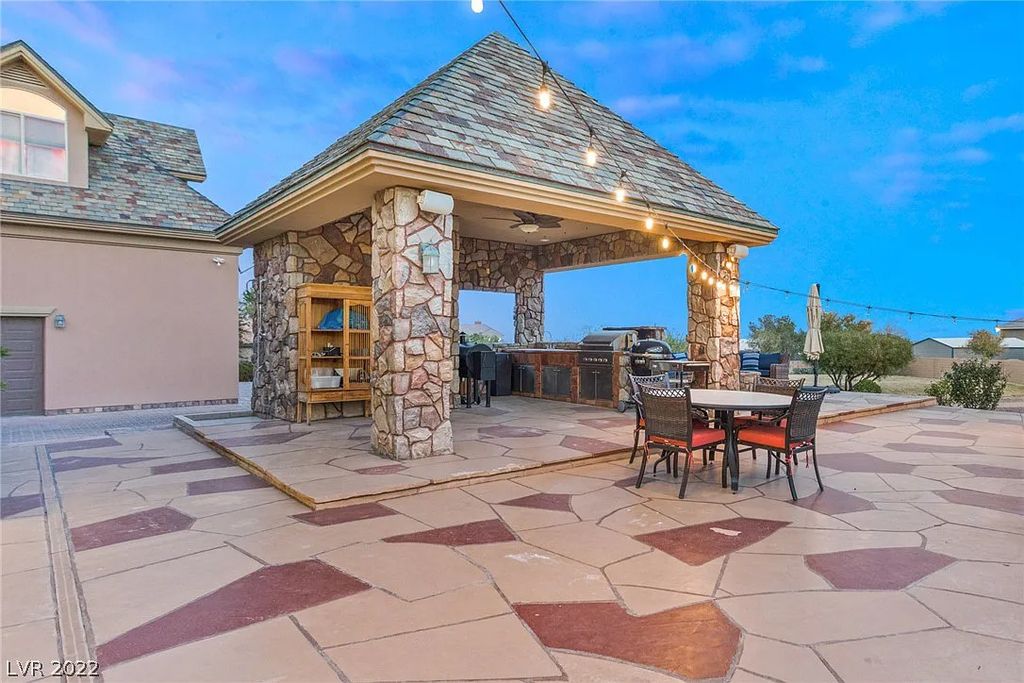 9775 Severence Lane, Las Vegas, Nevada is a a one-of-a-kind property that sets the standard for luxurious living with expertly crafted finishes, turrets, custom built-ins, hardwood floors, and cathedral ceilings.