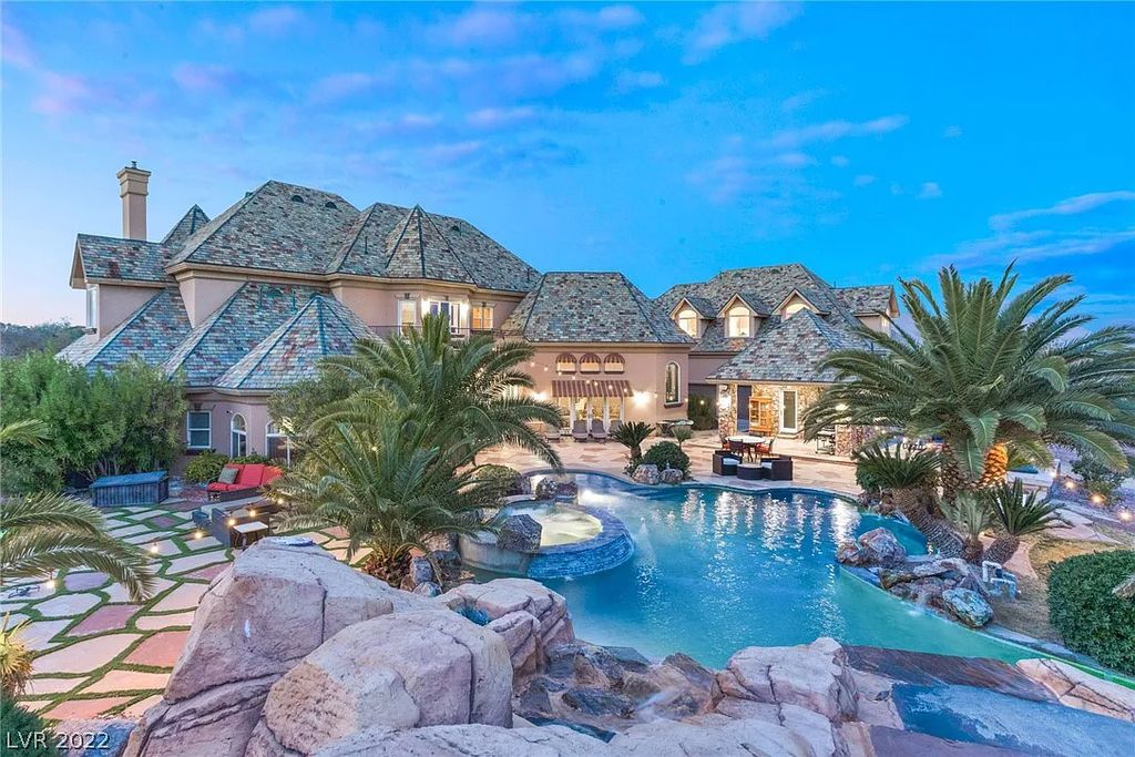 9775 Severence Lane, Las Vegas, Nevada is a a one-of-a-kind property that sets the standard for luxurious living with expertly crafted finishes, turrets, custom built-ins, hardwood floors, and cathedral ceilings.