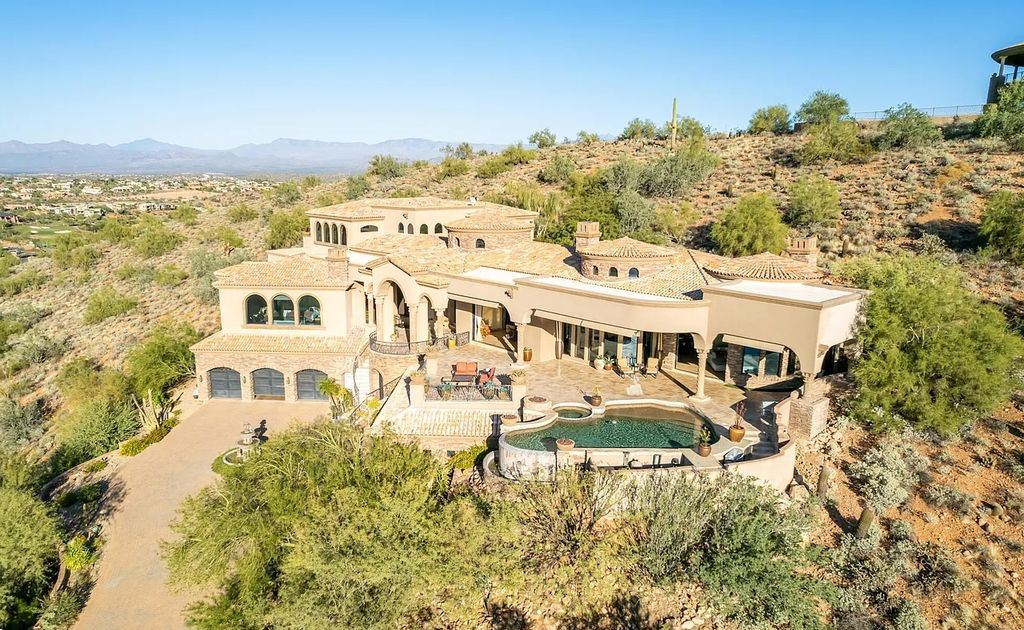 9245 N Vista Verde Court, Fountain Hills, Arizona is an entertainer's estate with both indoor & outdoor al-fresco living, majestic views from every area, all up to date Technology system for the entire house.