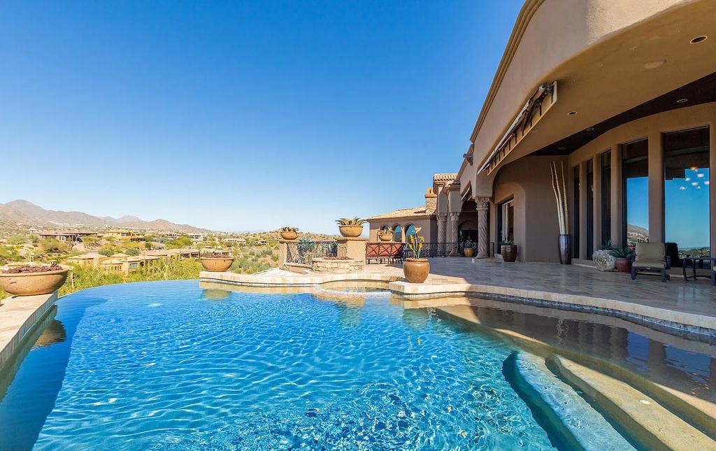 9245 N Vista Verde Court, Fountain Hills, Arizona is an entertainer's estate with both indoor & outdoor al-fresco living, majestic views from every area, all up to date Technology system for the entire house.