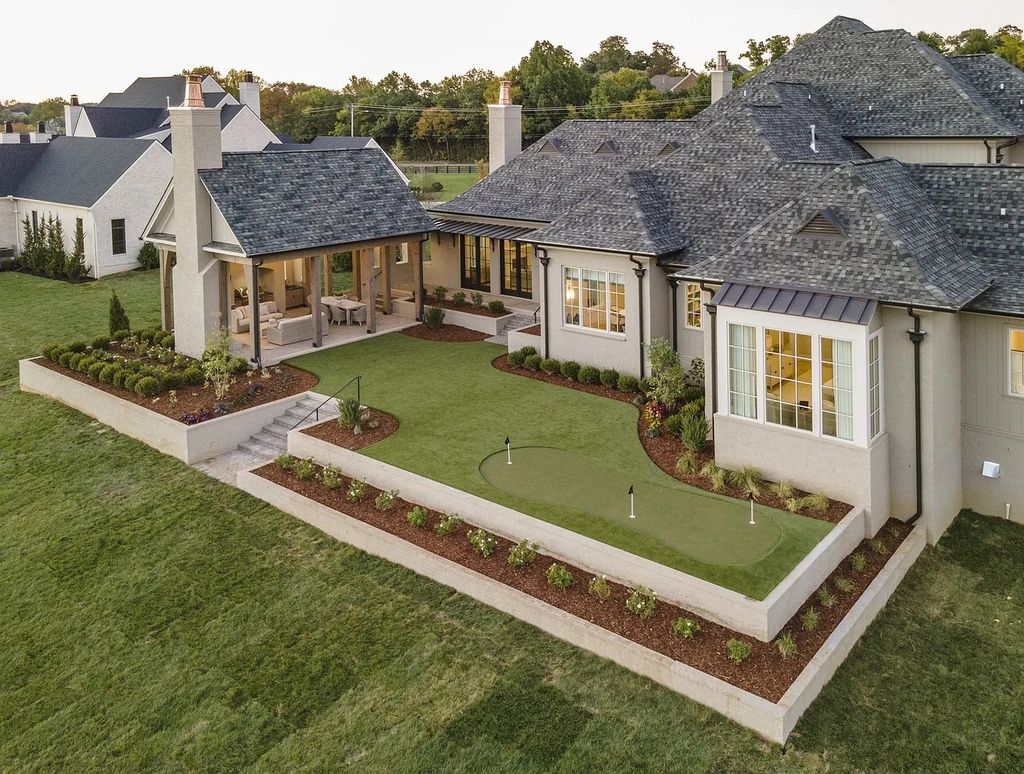 The Estate in Brentwood is a luxurious home accessed by a fabulous courtyard now available for sale. This home located at 1557 Sunset Rd Lot 6, Brentwood, Tennessee; offering 05 bedrooms and 08 bathrooms with 7,685 square feet of living spaces.