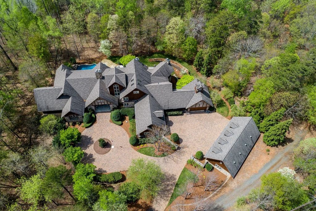 The Estate in Charlotte is a luxurious home architecturally designed and crafted by Arcadia Custom Homes now available for sale. This home located at 9235 Sweetleaf Pl, Charlotte, North Carolina; offering 06 bedrooms and 09 bathrooms with 17,135 square feet of living spaces.