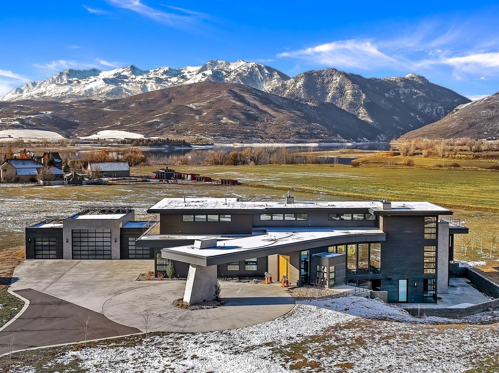 1315 N 6900 E, Huntsville, Utah is truly a one-of-a-kind modern piece of art which gives the owner a sense of unmatched pride while elevating the enjoyment of your living experience to an entirely new level. 