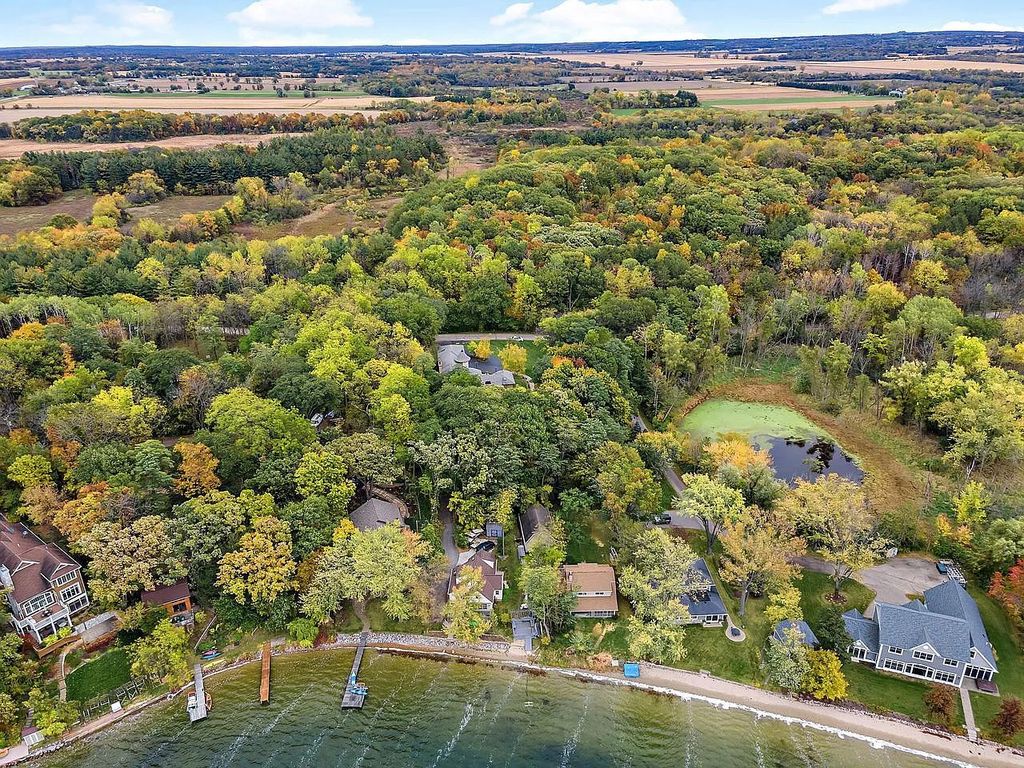 The Home in East Troy is a luxurious home with panoramic views of the lake, now available for sale. This home located at N8115 Pleasant Lake Rd, East Troy, Wisconsin