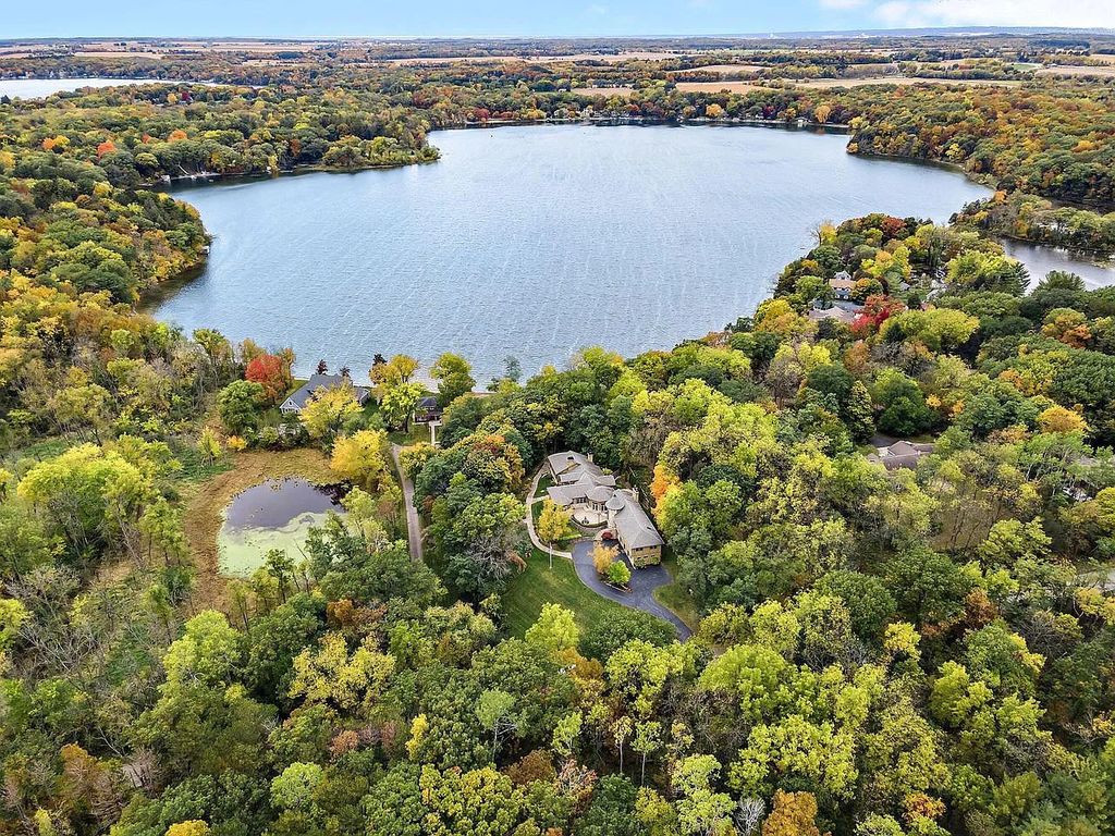 The Home in East Troy is a luxurious home with panoramic views of the lake, now available for sale. This home located at N8115 Pleasant Lake Rd, East Troy, Wisconsin