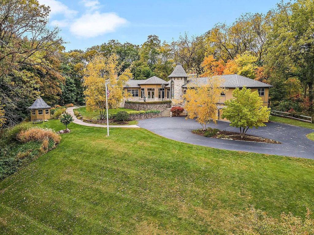 The Home in East Troy is a luxurious home with panoramic views of the lake, now available for sale. This home located at N8115 Pleasant Lake Rd, East Troy, Wisconsin