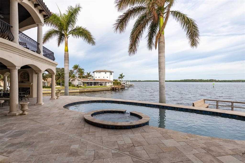 2093 Carolina Ave NE, Saint Petersburg, Florida is a luxury residence built by Campagna Homes situated on two lots with direct access to the open waters of Tampa Bay only 15 miles to our world renowned St Pete Beach. 
