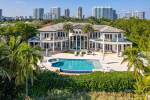 Experience Ocean Front Living at Its Finest in This Exceptional Estate with over 15,000 SF Living Space in Golden Beach, Florida