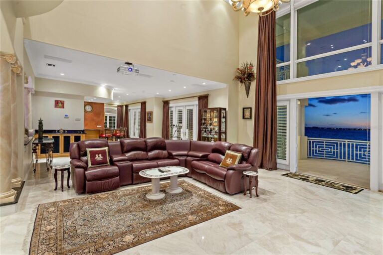 A Bayway Isles Mansion on A Point Lot with Magnificent Open Water Views