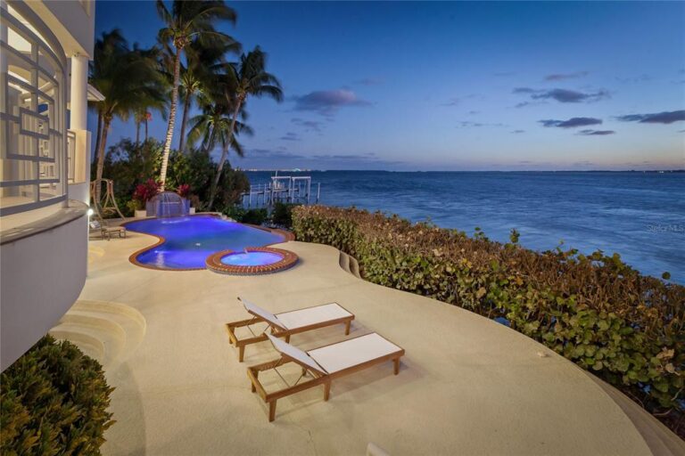 A Bayway Isles Mansion on A Point Lot with Magnificent Open Water Views