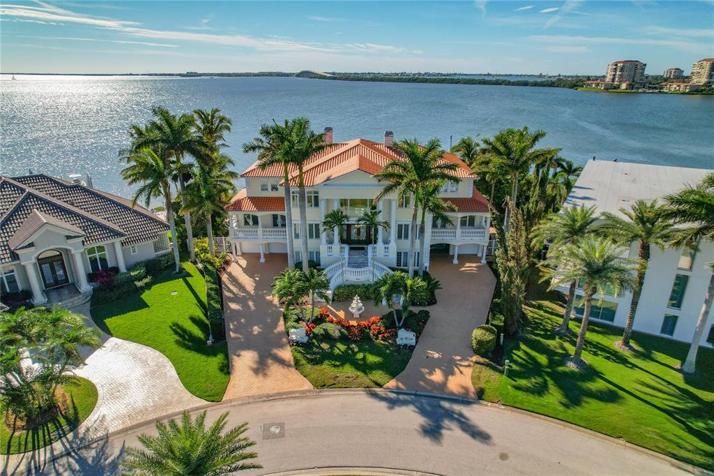 6199 54th St S, Saint Petersburg, Florida is a waterfront estate was designed to enjoy entertaining and outdoor living with expansive waterfront decks to experience a seamless indoor outdoor living with waterfall surrounded by mature privacy landscape.