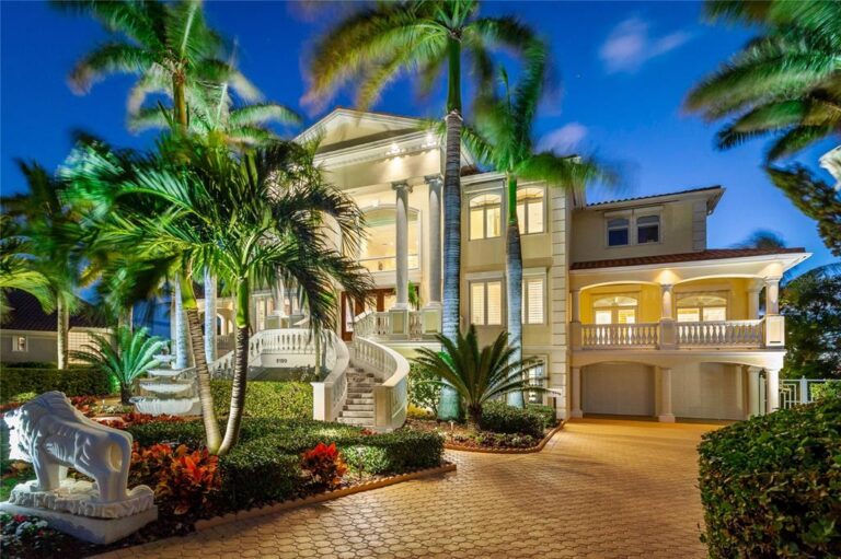 A Bayway Isles Mansion on A Point Lot with Magnificent Open Water Views