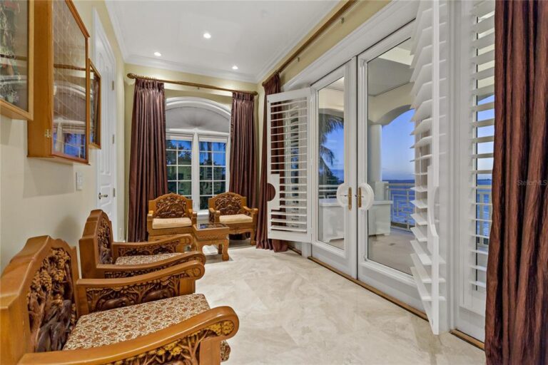 A Bayway Isles Mansion on A Point Lot with Magnificent Open Water Views