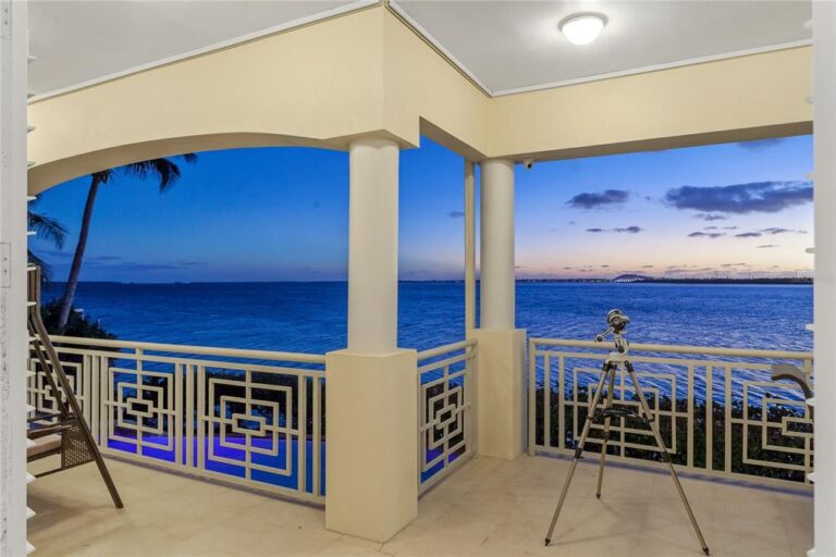 A Bayway Isles Mansion on A Point Lot with Magnificent Open Water Views