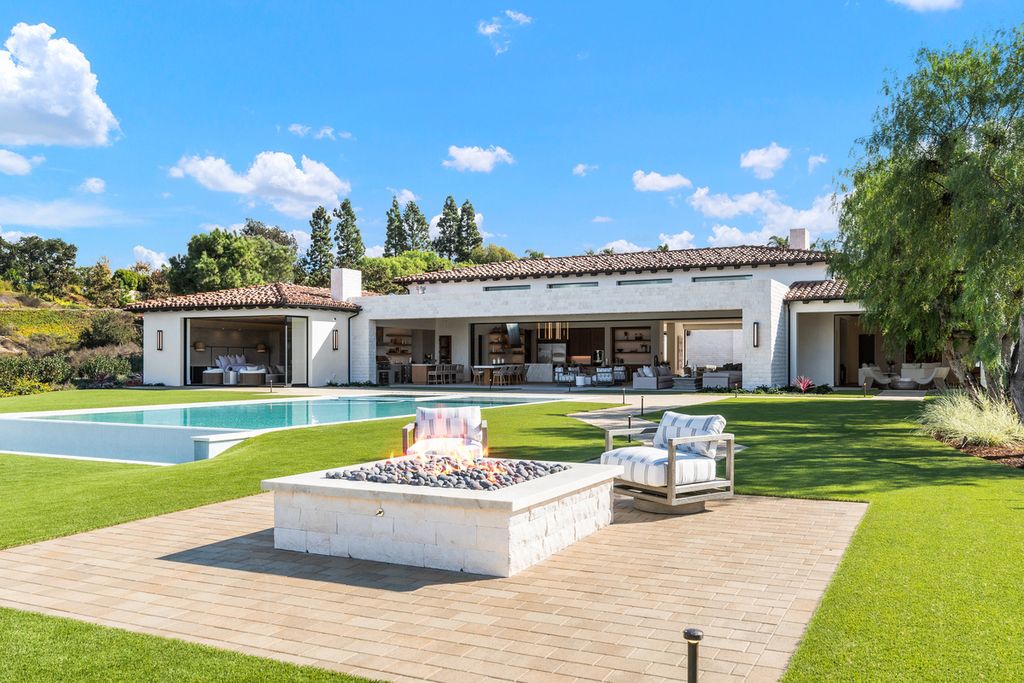 5940 Ladys Secret Drive, Rancho Santa Fe, California is a brand new estate tucked away in a convenient and prestigious gated community and sitting on a premier 2.43 acre site boasting the epitome of Resort Living.