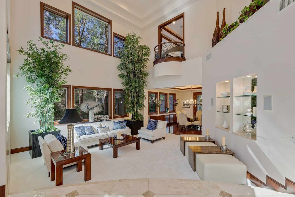 10 Fire Rock Court, Las Vegas, Nevada in prime location surrounding the Southern Highlands Golf Course, boasting of incredible interior with fresh paint, brand-new light fixtures, and wood-framed windows that bathe the entire house in natural light.