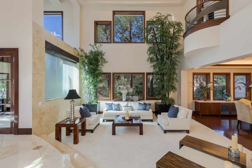 10 Fire Rock Court, Las Vegas, Nevada in prime location surrounding the Southern Highlands Golf Course, boasting of incredible interior with fresh paint, brand-new light fixtures, and wood-framed windows that bathe the entire house in natural light.