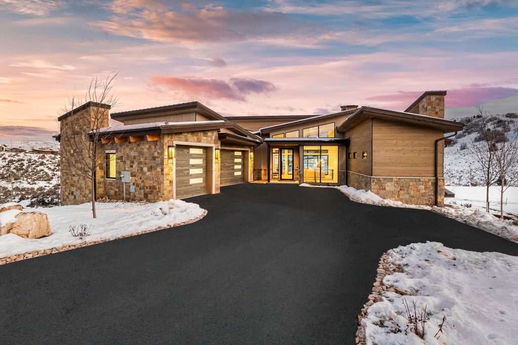 3914 E Firestar Court, Kamas, Utah is a stunning custom build located within the ''Whispering Hawk'' neighborhood of the private, gated Talisker Club community, Tuhaye, and backing onto the emerald green 15th fairway of the award-winning Mark O'Meara designed championship golf course.
