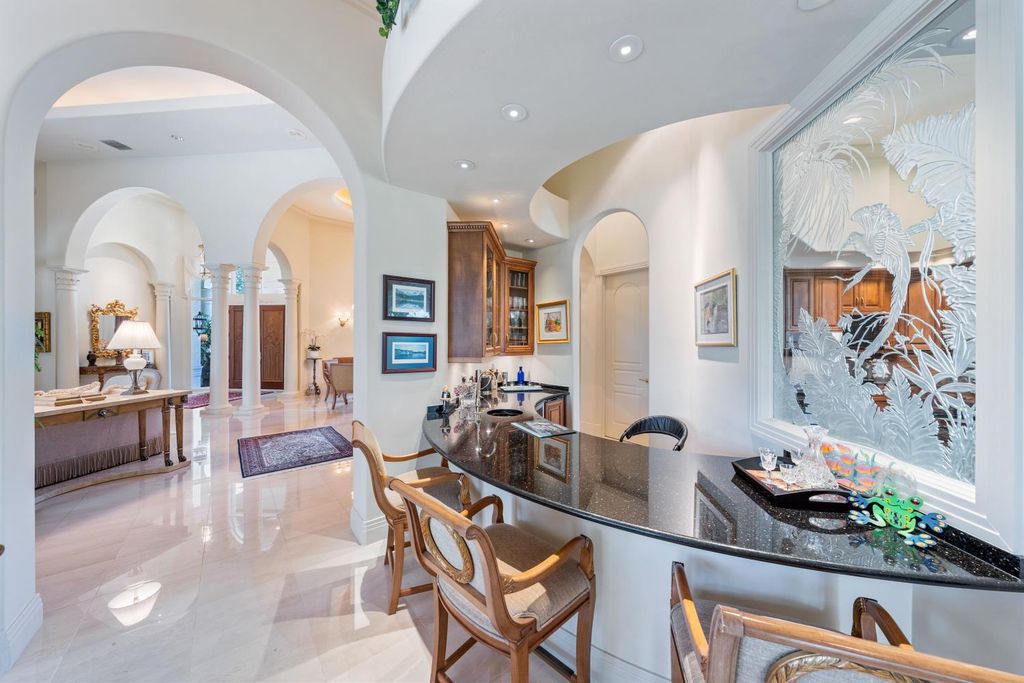 4188 Brynwood Drive, Naples, Florida, has a well-designed floor plan with long water and golf views. Because of the ample entertainment space inside and out, as well as the new roof for the interior and exterior, this home will be able to accommodate anyone's wish list in 2020.