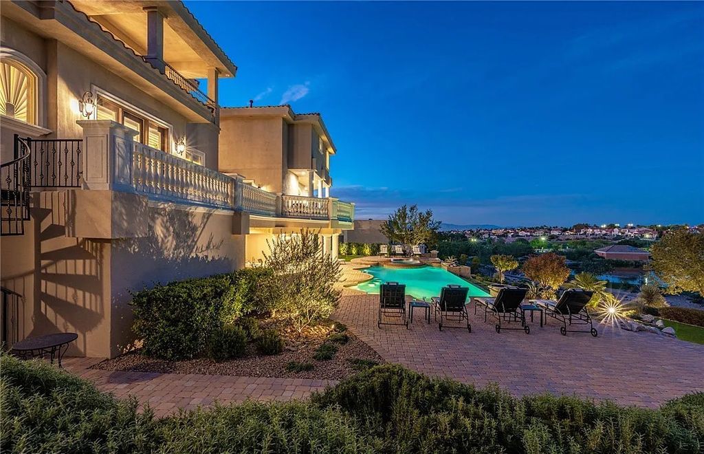 2876 Quartz Canyon Drive, Henderson, Nevada is custom-built residence has been updated with the finest finishes boasting gorgeous views of the Las Vegas Strip, the golf course, the lake, and mountains in every direction.