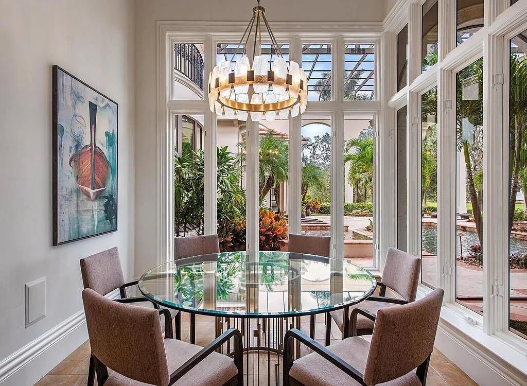 4454 Wayside Drive, Naples, Florida, is built on two estate lots with uncompromising architectural detailing, custom finishes, panoramic vistas, and beautiful lake views. This special residence takes gracious living to a whole new level.