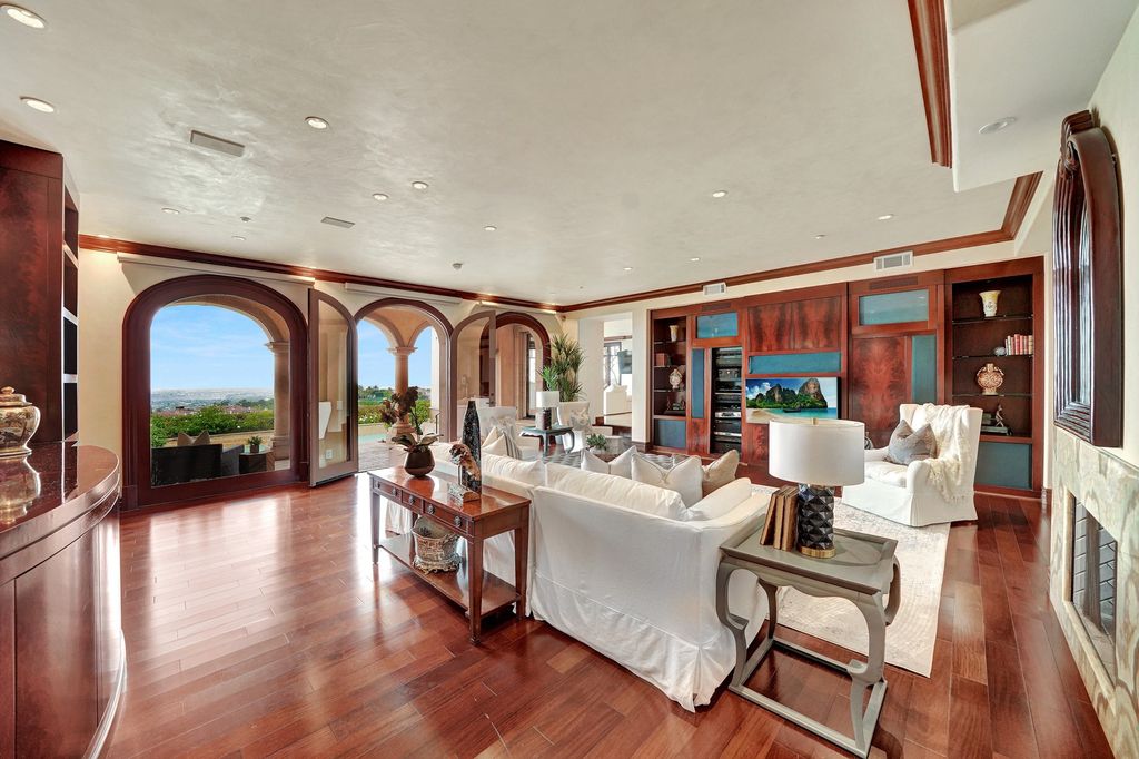 17 Sailcrest, Newport Coast, California is an impeccably built residence in the guard-gated community with unparalleled views of the ocean, city lights, Newport harbor, coastline from almost every room.