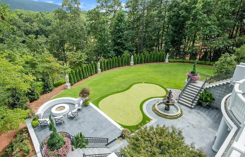 10 Augusta Way, Shoal Creek, Alabama is a private compound on prestigious Shoal Creek Golf and Country Club on 3.4 Acre with an array of richly appointed features and materials.
