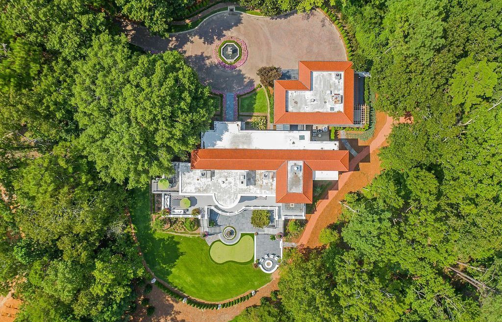 10 Augusta Way, Shoal Creek, Alabama is a private compound on prestigious Shoal Creek Golf and Country Club on 3.4 Acre with an array of richly appointed features and materials.