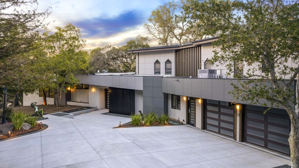 11195 Hooper Lane, Los Altos Hills, California is is the epitome of modern development with finest features; sleek lines, tiered ceilings, mood lighting, zoned heating AC, premium appliances and smart home tech, the finishes are 2nd to none.