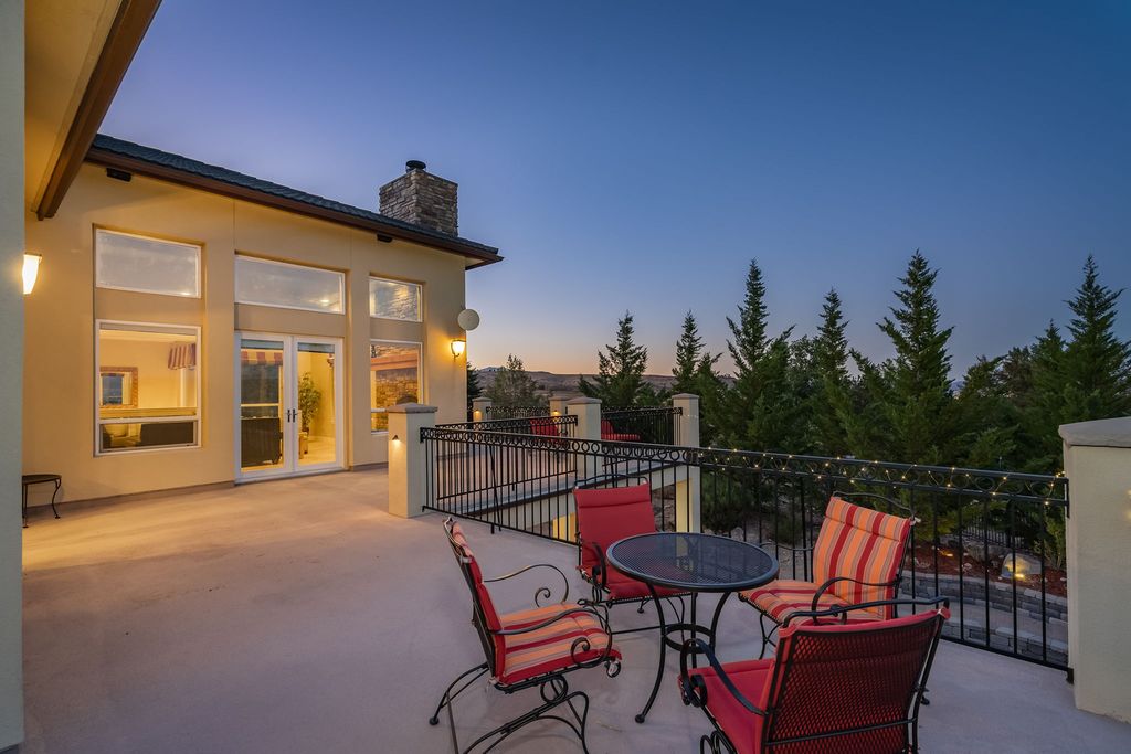 220 Brunswick Mill Road, Reno, Nevada is a thoughtfully designed custom estate on a 2.5 acre fully-fenced lot with gated entrance and a variety of landscape accents such as a relaxing water feature, wind-protected firepit with surround seating, private putting green, basketball court.