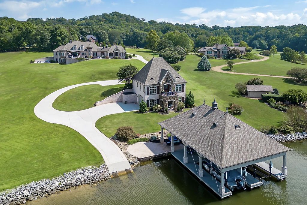 The Estate in Louisville is a luxurious home located on a beautiful shoreline now available for sale. This home located at 4240 Lake Meadow Way, Louisville, Tennessee; offering 05 bedrooms and 08 bathrooms with 8,542 square feet of living spaces.