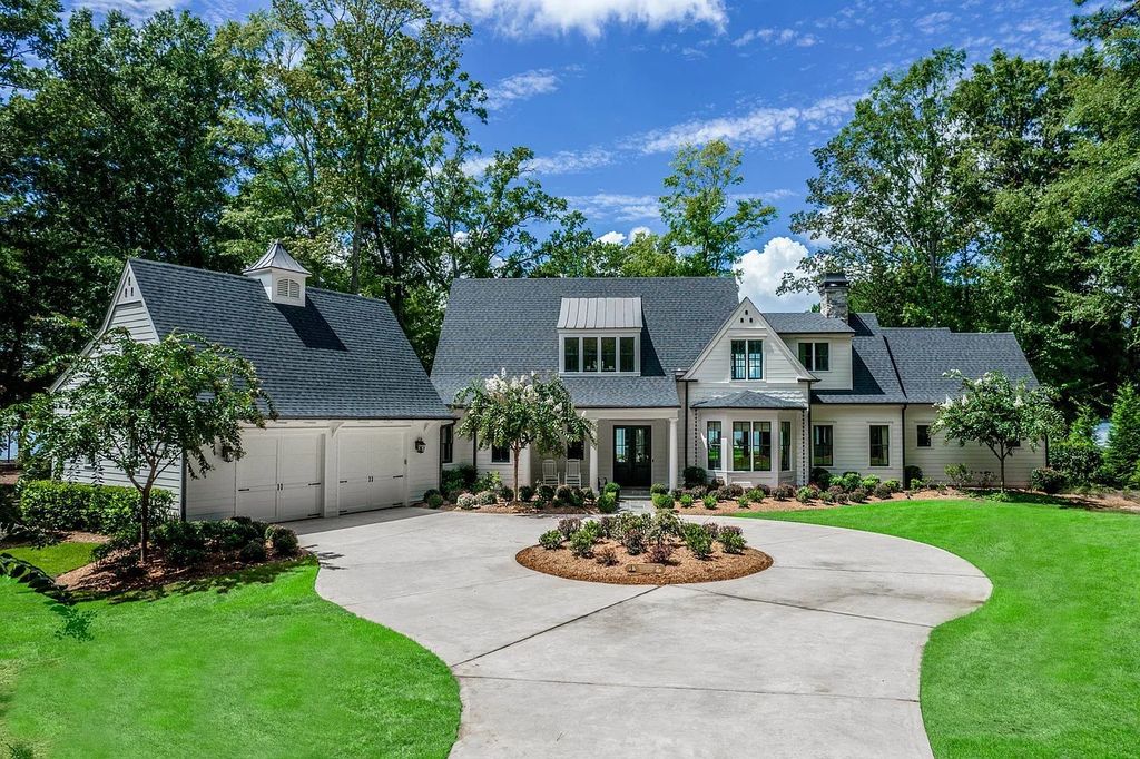 The House in Eatonton boasts gorgeous landscaping and 180 degree views of Lake Oconee, now available for sale. This home located at 158 Bradford Dr, Eatonton, Georgia