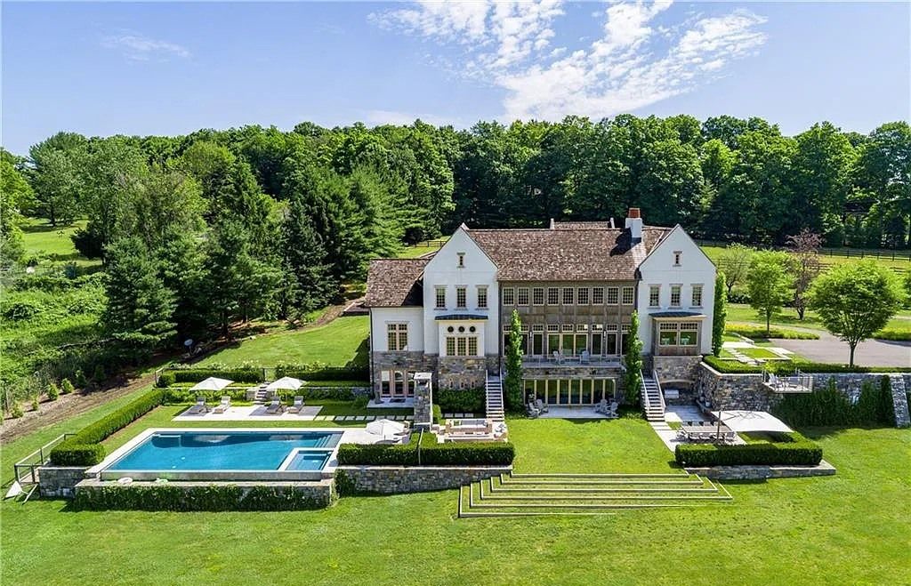 The Estate in Redding is a luxurious home designed for modern sophisticate and serenely private leisure now available for sale. This home located at 187 Umpawaug Rd, Redding, Connecticut; offering 07 bedrooms and 09 bathrooms with 9,720 square feet of living spaces.