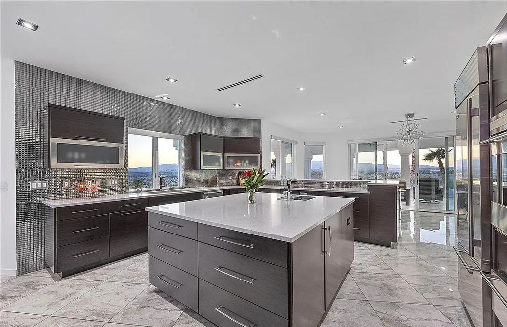 460 Probst, Las Vegas, Nevada is an exquisitely crafted custom privately gated compound featuring the ultimate in privacy and modern design with breathtaking mountain and strip views from all overs.