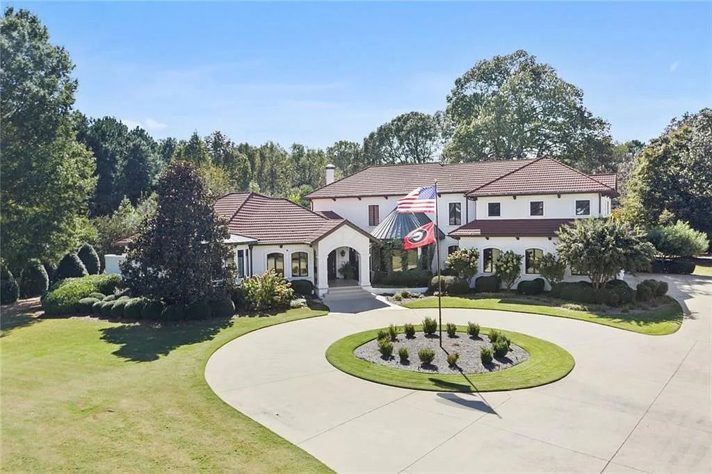 The Home in Kennesaw is the entertainers delight with large open spaces and a salt water pool with a connecting hot tub and wine cellar, now available for sale. This home located at 4235 Old Stilesboro Rd NW, Kennesaw, Georgia