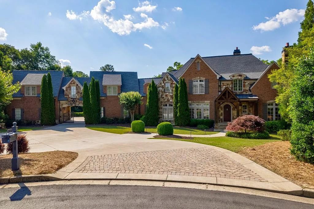 The Estate in Roswell includes a brand-new roof, a four-car garage with an expansive parking area, newly painted throughout, resurfaced hardwood floors and more, now available for sale. This home located at 13270 Addison Rd, Roswell, Georgia
