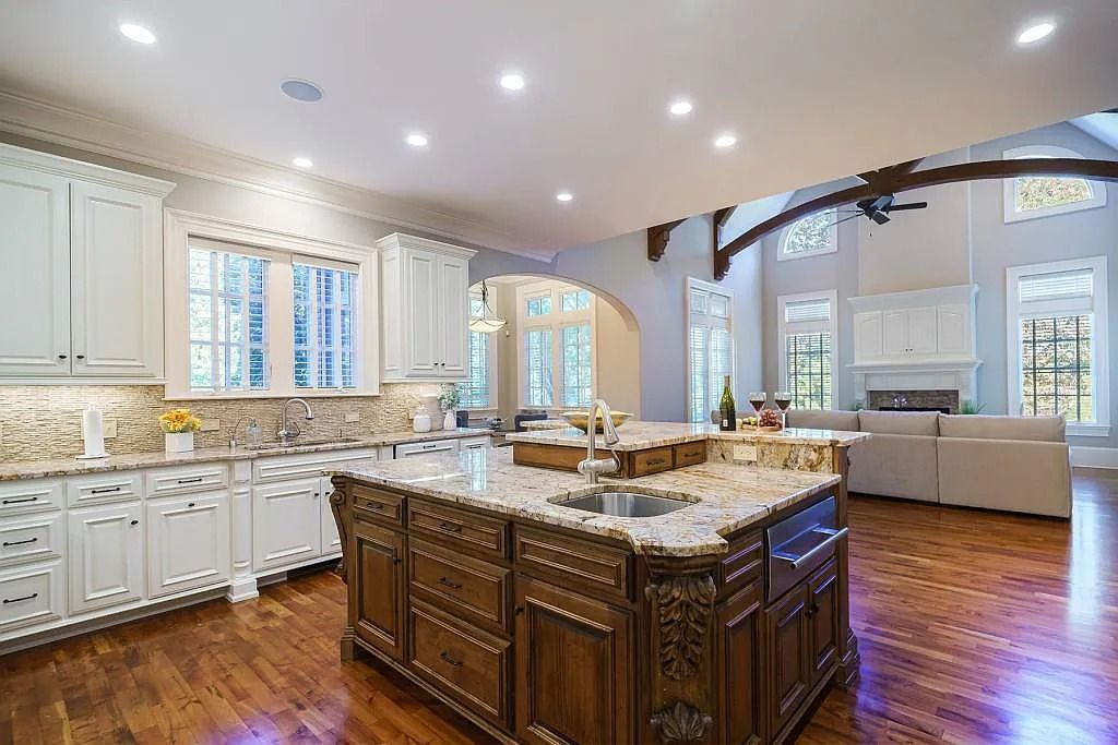 The Estate in Roswell includes a brand-new roof, a four-car garage with an expansive parking area, newly painted throughout, resurfaced hardwood floors and more, now available for sale. This home located at 13270 Addison Rd, Roswell, Georgia