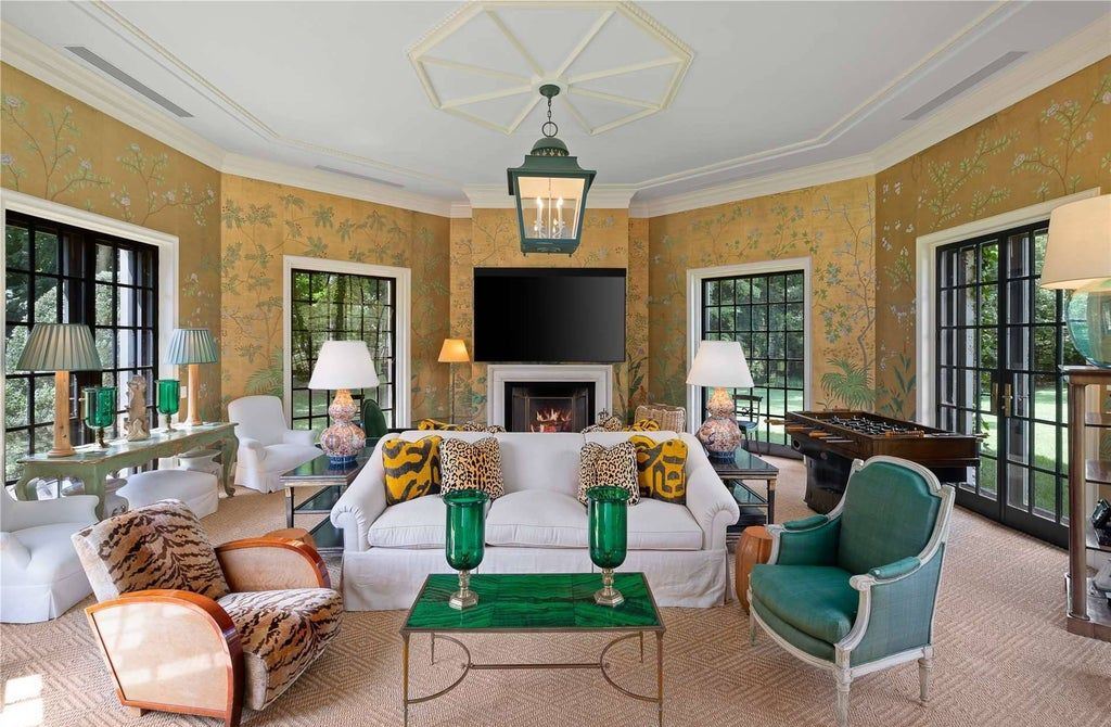 339 Duck Pond Road, Locust Valley, New York is a one of a kind home originally built in 1926 in the prestigious Village of Matinecock with exceptional amenities including a pool, pool house, tennis court, outdoor kitchen, gardens and terraces. elevator, nest system, 3,000 bottle wine cellar, art studio and more.