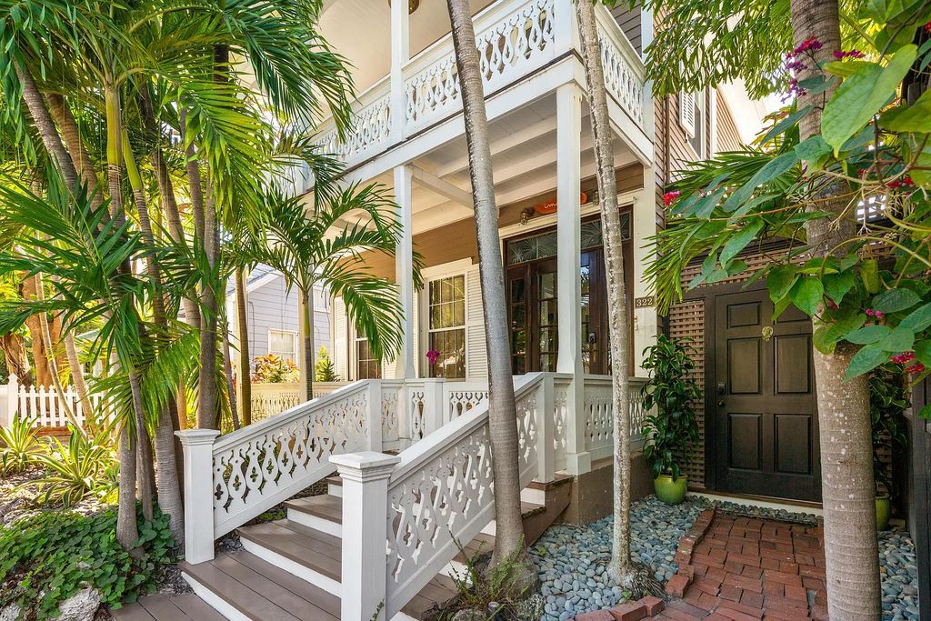 322 Elizabeth Street, Key West, Florida, was built around 1890 by ship captain Benjamin Saunders and has recently been beautifully restored. This classic revival home is located in the heart of Old Town, two blocks from downtown Duval Street and close to the historic seaport, restaurants, and attractions.